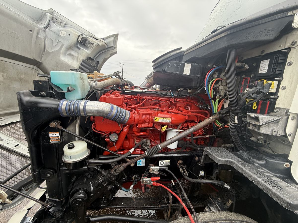 Cummins engine in a semi truck with the hood open